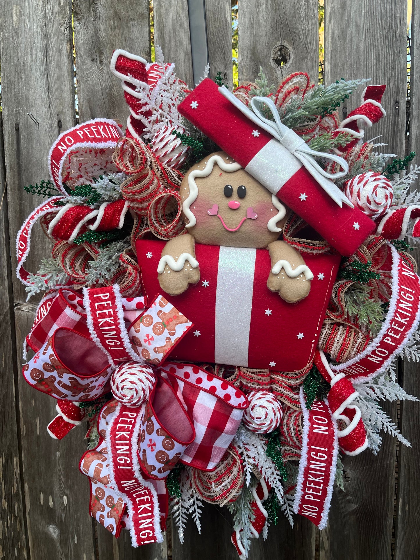Christmas Gingerbread in a present front door wreath, Festive front door decor with Gingerbread and presents, Holiday decor for the home, Gingerbread collection
