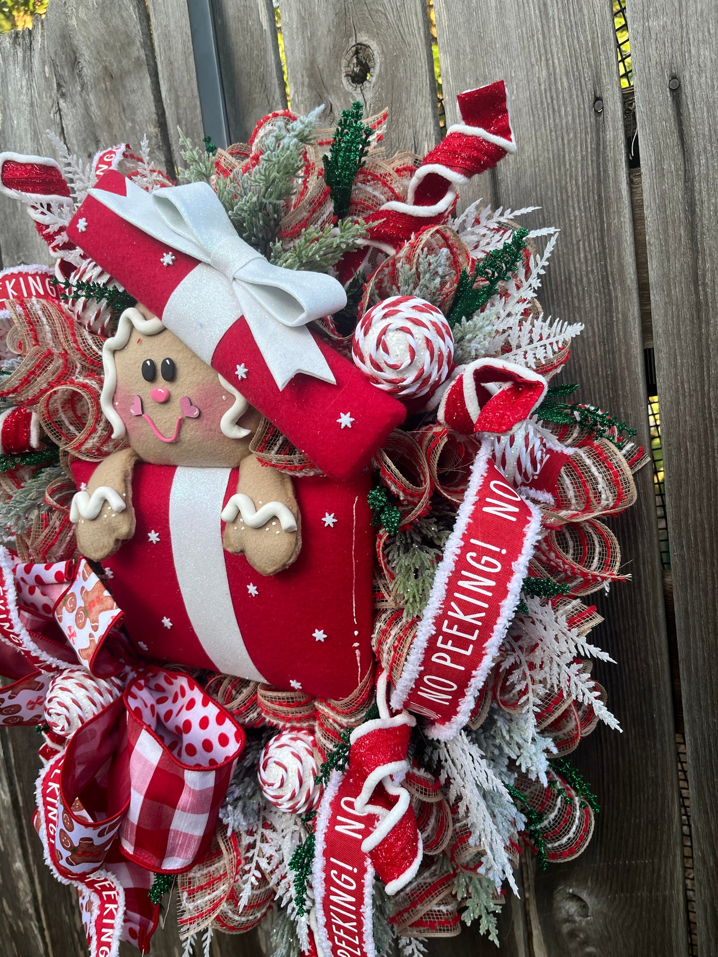 Christmas Gingerbread in a present front door wreath, Festive front door decor with Gingerbread and presents, Holiday decor for the home, Gingerbread collection
