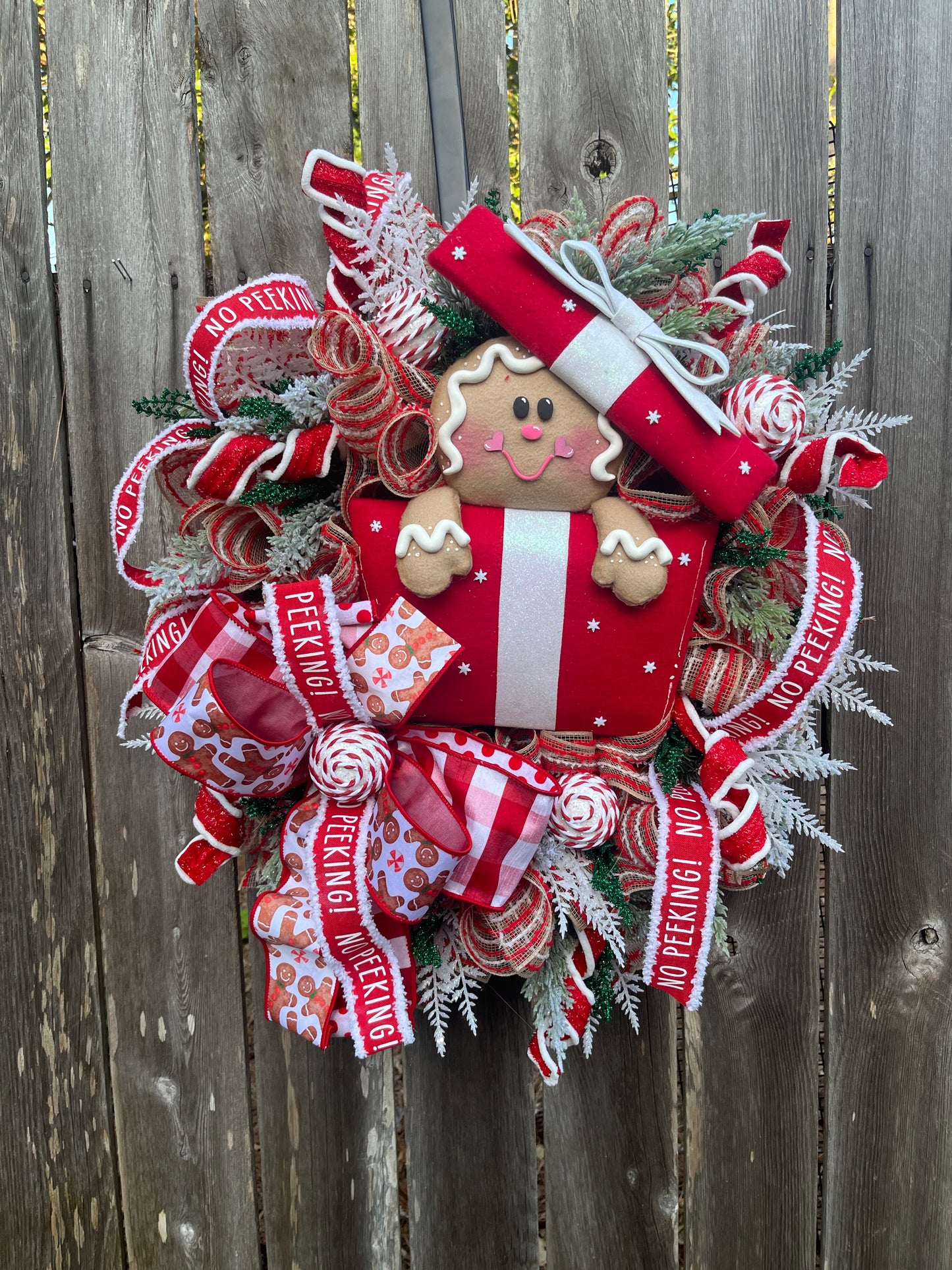 Christmas Gingerbread in a present front door wreath, Festive front door decor with Gingerbread and presents, Holiday decor for the home, Gingerbread collection